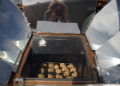 Cookies baking in the solar oven. Photo by Andrew Blackwelder.